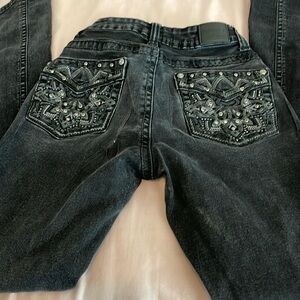 A little washed out but still very cute and no rips and no stains!